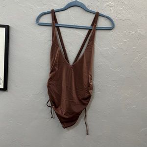 Brown shiny one piece